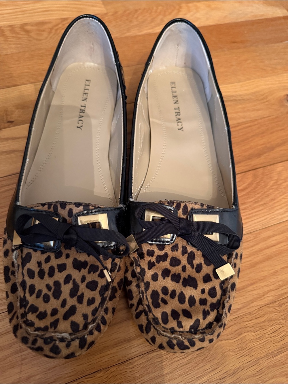 Ellen Tracy Leopard-Print Moccasins with Black Trim and Bow Accents
